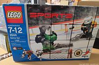 Front view of sealed Lego Sports 3544 box showing age range, piece count and graphics