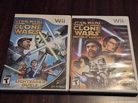 Front view of both Wii game cases side by side