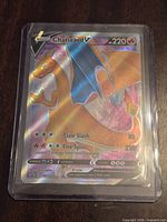 Front view of Charizard V promo card in sleeve/toploader