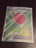 Front of sleeved Air Balloon full art holographic card