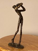 Full view bronze abstract sculpture front angle