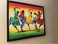 Full view of framed painting on wall showing size and frame