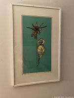 Full view of framed serigraph showing artwork, mat, frame