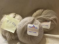 Three labelled balls of Pingouin Soft' Hair yarn with note indicating 3 x 50g