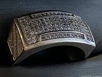 Ring top showing pavé CZ rows and geometric borders