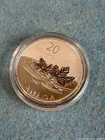 Reverse of 2012 Farewell To The Penny $20 silver coin in capsule
