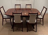 Six Farstrup chairs around table (table not included) showing overall style and upholstery
