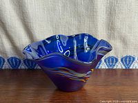 Front view showing overall form, color, and swirl design