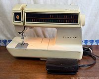 Singer Touch-Tronic 2001 sewing machine front view showing stitch panel and sewing surface