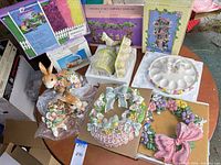 Overall lot showing boxed items, wreaths, bunnies, egg platter