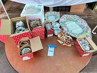 overall lot with boxed Fitz and Floyd items and visible platter