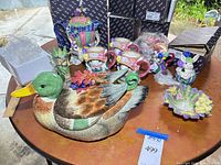 Group shot showing all Fitz and Floyd pieces including soup tureen, teapot, mugs, vase, dish and candlesticks
