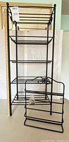 Shelving unit and magazine rack with ruler for scale
