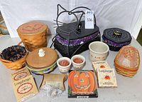 Group shot of all Longaberger Halloween baskets, crock, tie-ons, and accessories