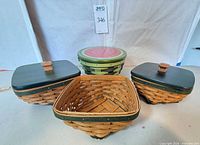 All four Longaberger baskets with lids displayed