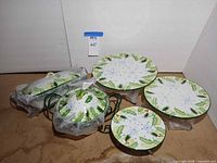 All five stoneware pieces grouped