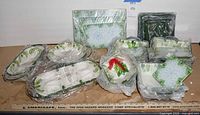 Group view of assorted Temp-Tations Hometown Christmas bakeware pieces wrapped for storage