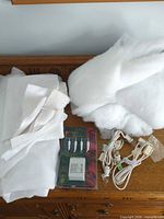 Overall lot: felt mats, batting, Lemax adaptor pack, three light cords