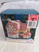 Retail box showing Holiday Expressions porcelain toy shop