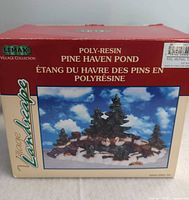 Retail box front showing Lemax branding and Pine Haven Pond model