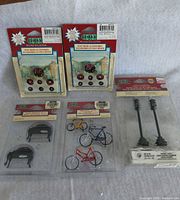 All five sealed Lemax accessory packs displayed