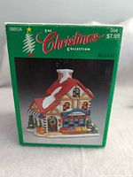 Retail box front showing The Christmas Collection Market house