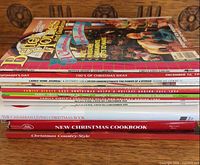 Side view of entire stack showing titles, spines and quantity