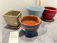 Group shot of all four ceramic planters