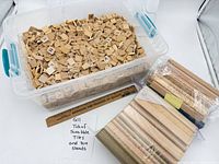 Overall lot showing tub of tiles, bundled racks and bag of racks