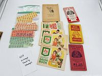 Lot overview showing all stamp booklets and bags of loose stamps