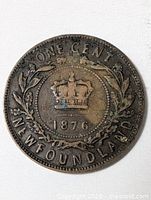 Reverse of 1876 Newfoundland one cent coin showing crown, wreath and legends