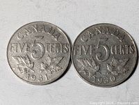 Front view of both 5-cent coins showing dates 1930 and 1931
