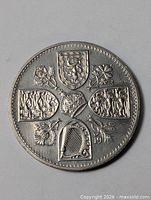 Reverse of 1960 five-shilling coin showing crowned shields and date