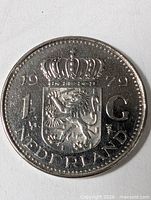 Reverse side with crowned coat of arms and denomination