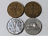 fronts of four Canadian 5-cent coins
