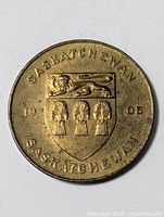 Obverse showing Saskatchewan coat of arms, date 1905, legend