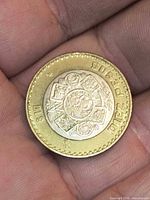 Obverse showing Aztec Calendar Stone and $10 denomination