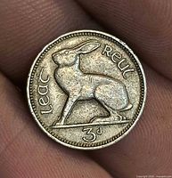 Reverse view of coin with hare motif and denomination