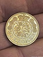 Obverse crowned arms and 20 KRONER legend
