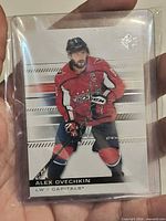 Front of Alex Ovechkin card in plastic top loader
