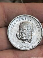 Obverse with raised portrait of Charles Tupper and date 1896