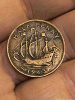 Reverse of 1943 half penny showing HMS Golden Hind and date