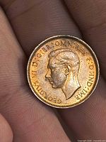 Obverse of 1945 George VI Farthing showing portrait and legend