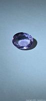 Oval faceted light purple amethyst front view
