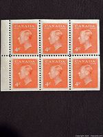 Front view of pane showing six 4¢ orange King George VI stamps with left selvedge