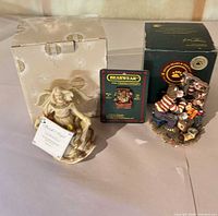 Overall view of all three items with their original boxes and card