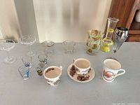 Full lot overview on tabletop showing all 14 pieces