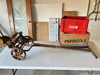 Lawn mower frame with both crates on table