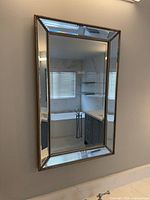 Front view of entire mirror mounted on wall