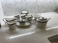 Full set laid out on countertop showing all pieces